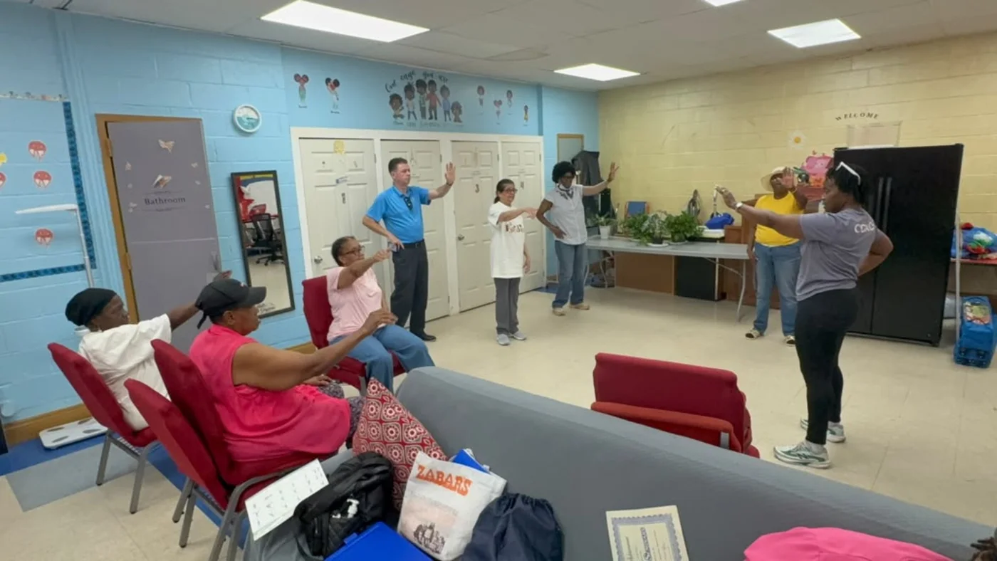 Participants use seated and standing movement options in one room